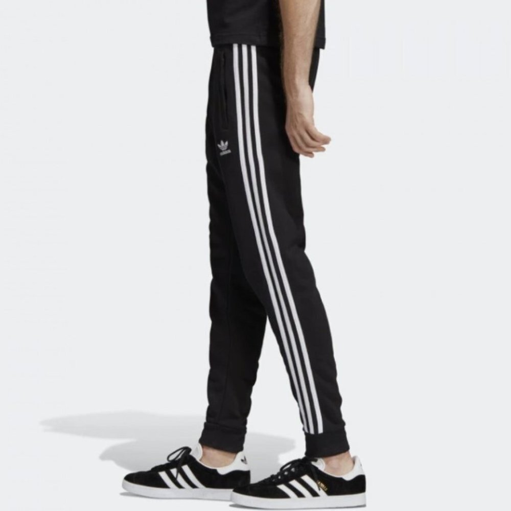 Adidas Junior's black essentials 3 stripes jogger pants size M